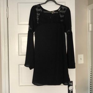 Black bell sleeve open back dress size M